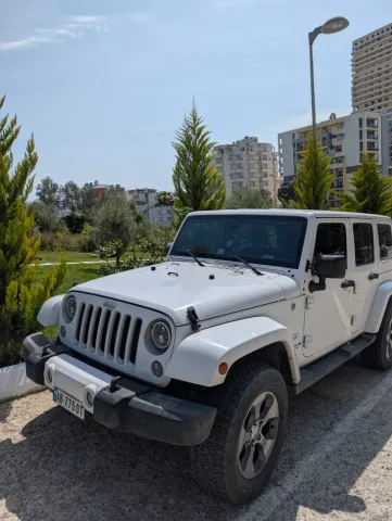 Durres, shes SUV - Jeep Wrangler Unlimited Sahara, viti 2016 Benzin, e bardhë manuale Kondicioner 117.500 km 20.000 €